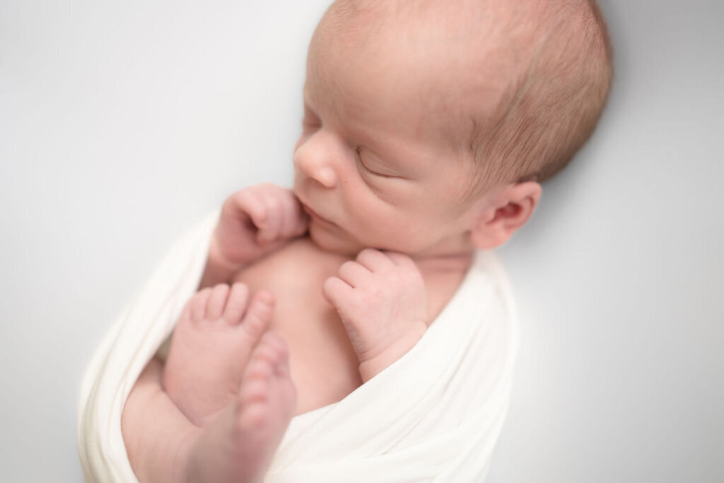 Samantha photographs sweet baby in a Newborn Photography session in her home studio in Edmonds WA.