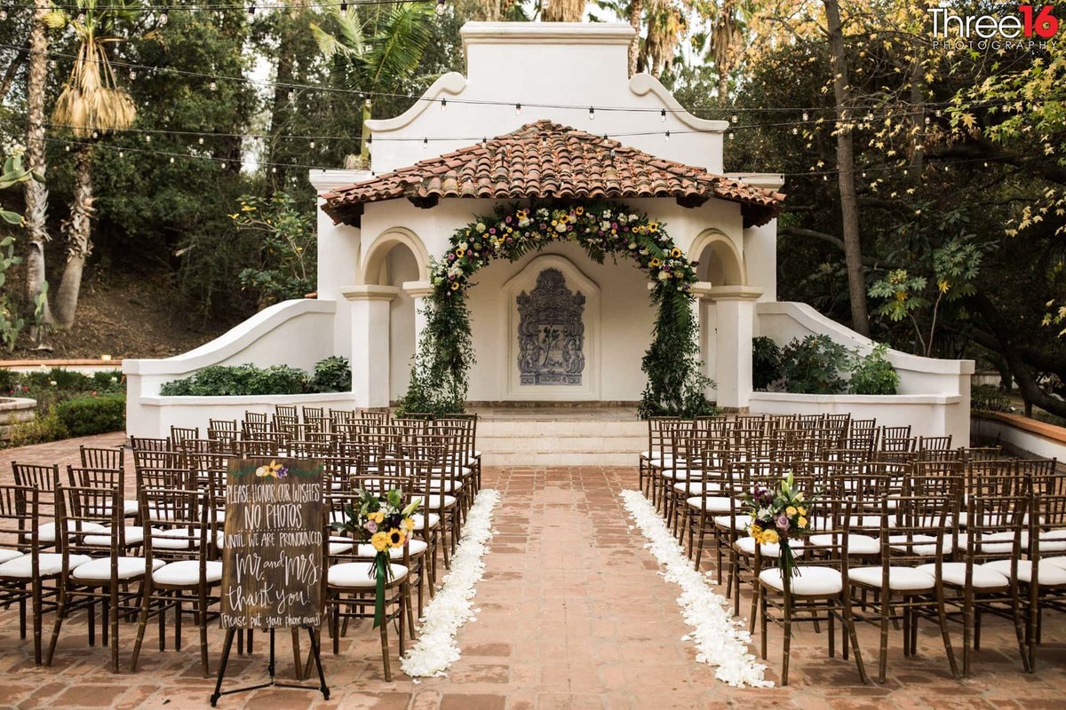 Beautiful outdoor wedding ceremony setup at Rancho Las Lomas