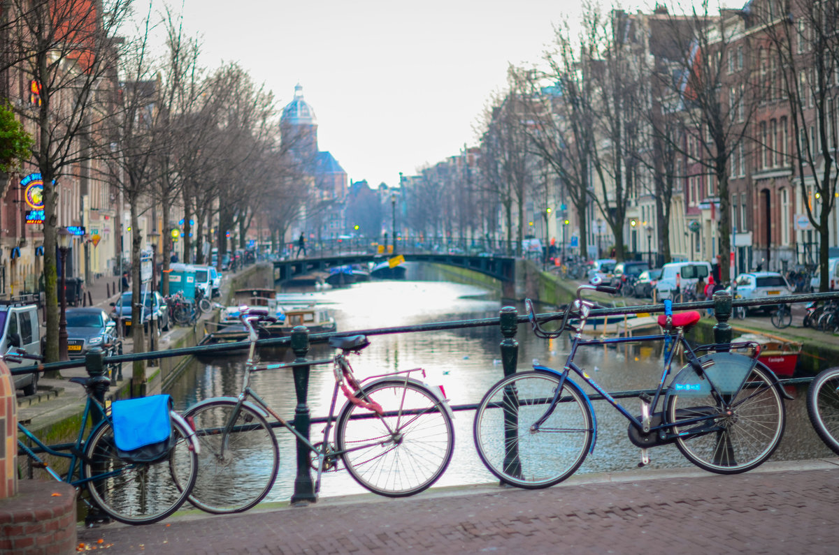 View of bicycles on Canal bridge in Amsterdam, netherlands