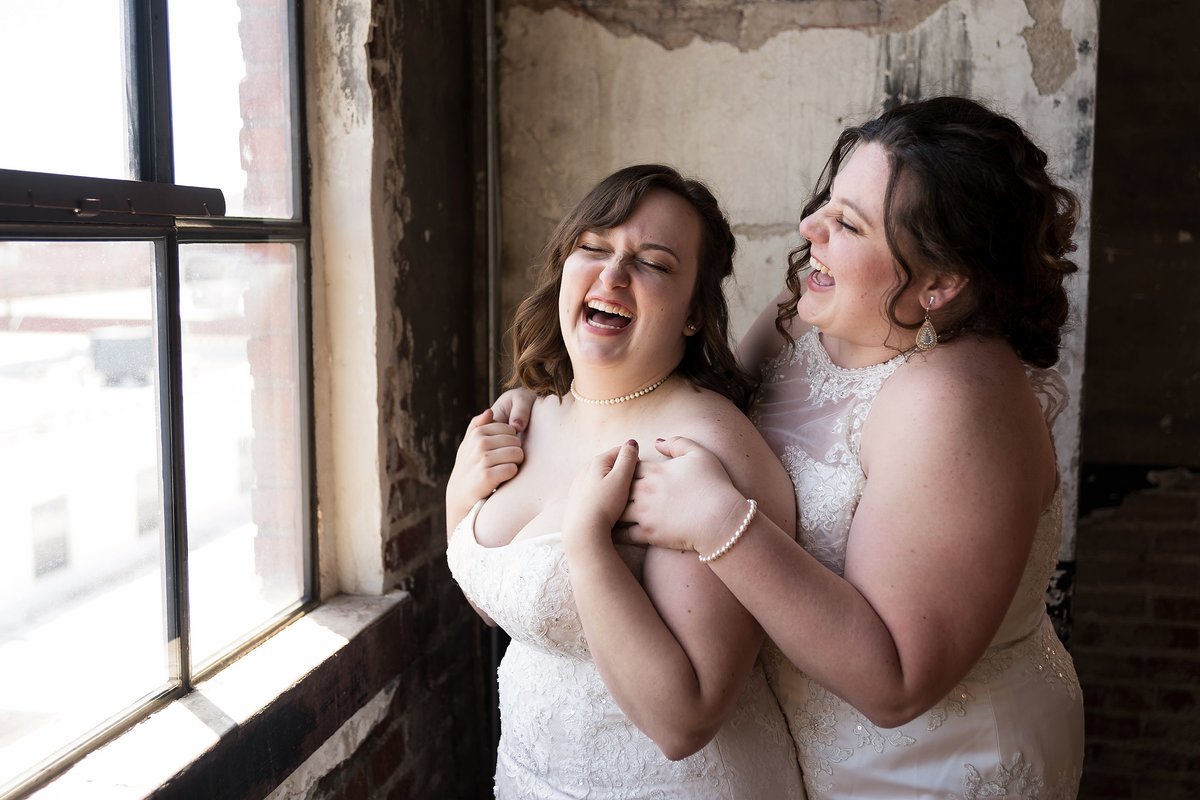 Couple's wedding photo at the Bride and the Bauer in Downtown KC. Same-Sex LGBT Wedding Photo