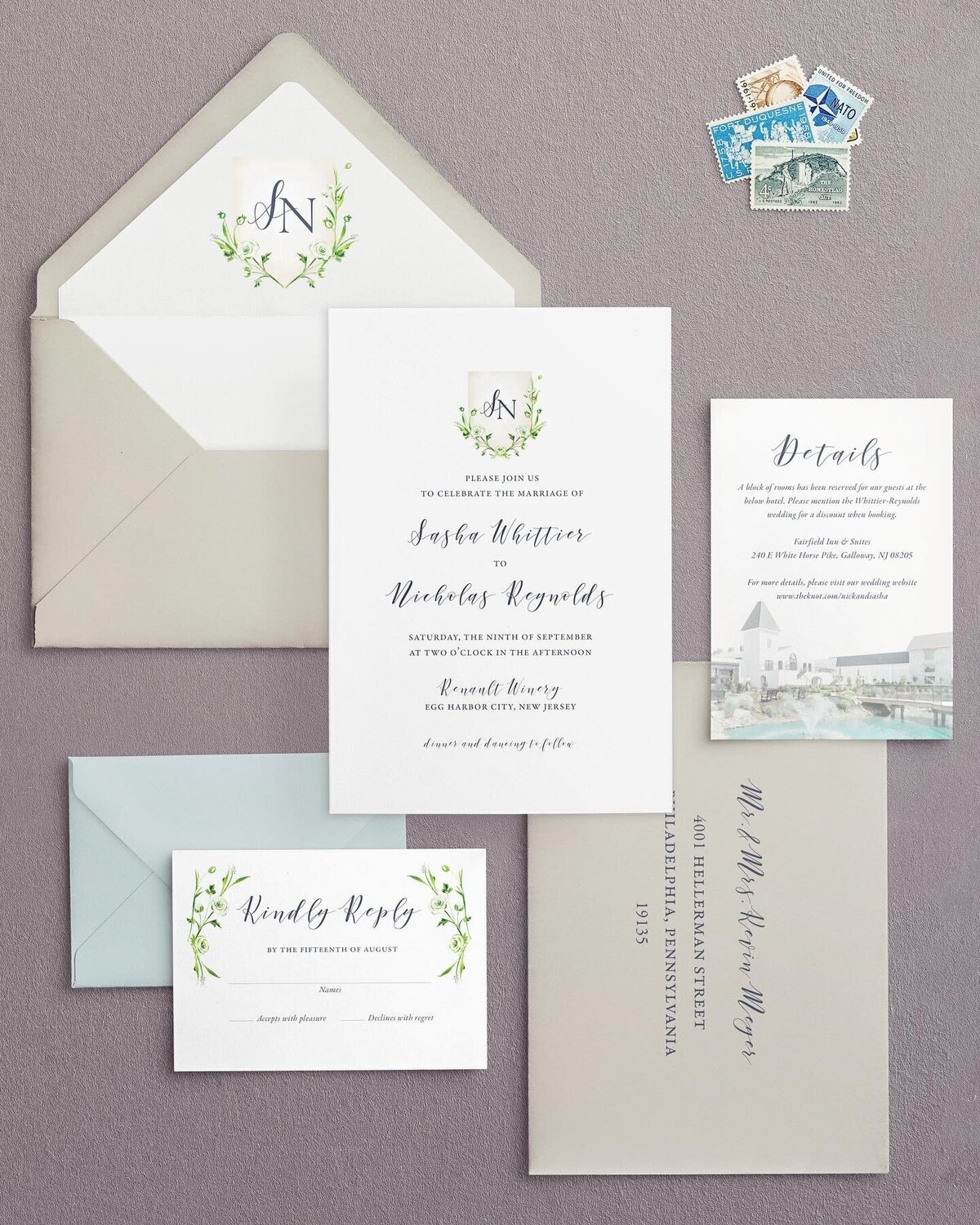 watercolor details wedding invitation with custom monogram and crest design