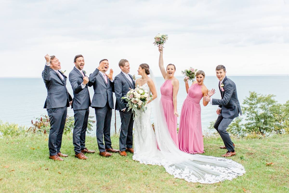 bridal party cheers and celebrates