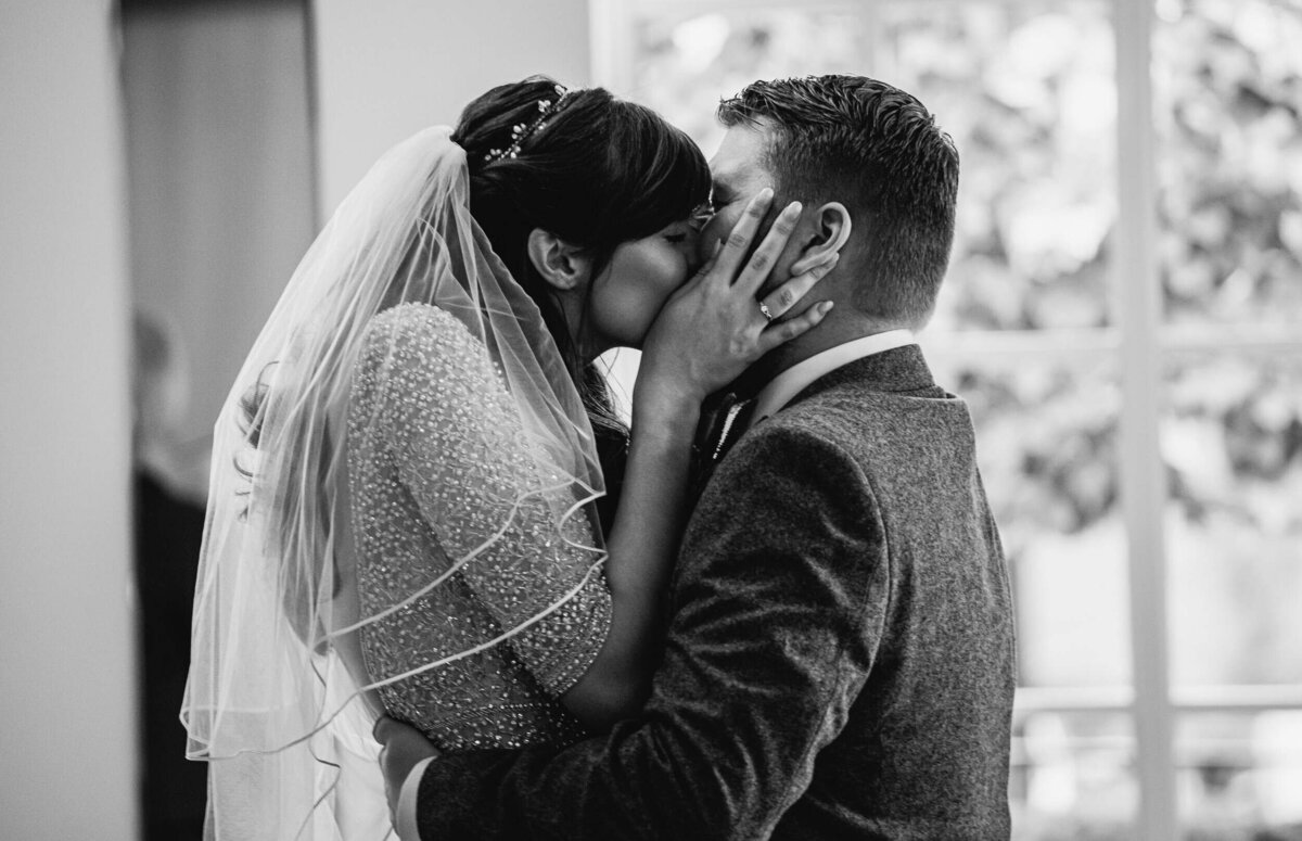 Bride and Groom kiss passionately