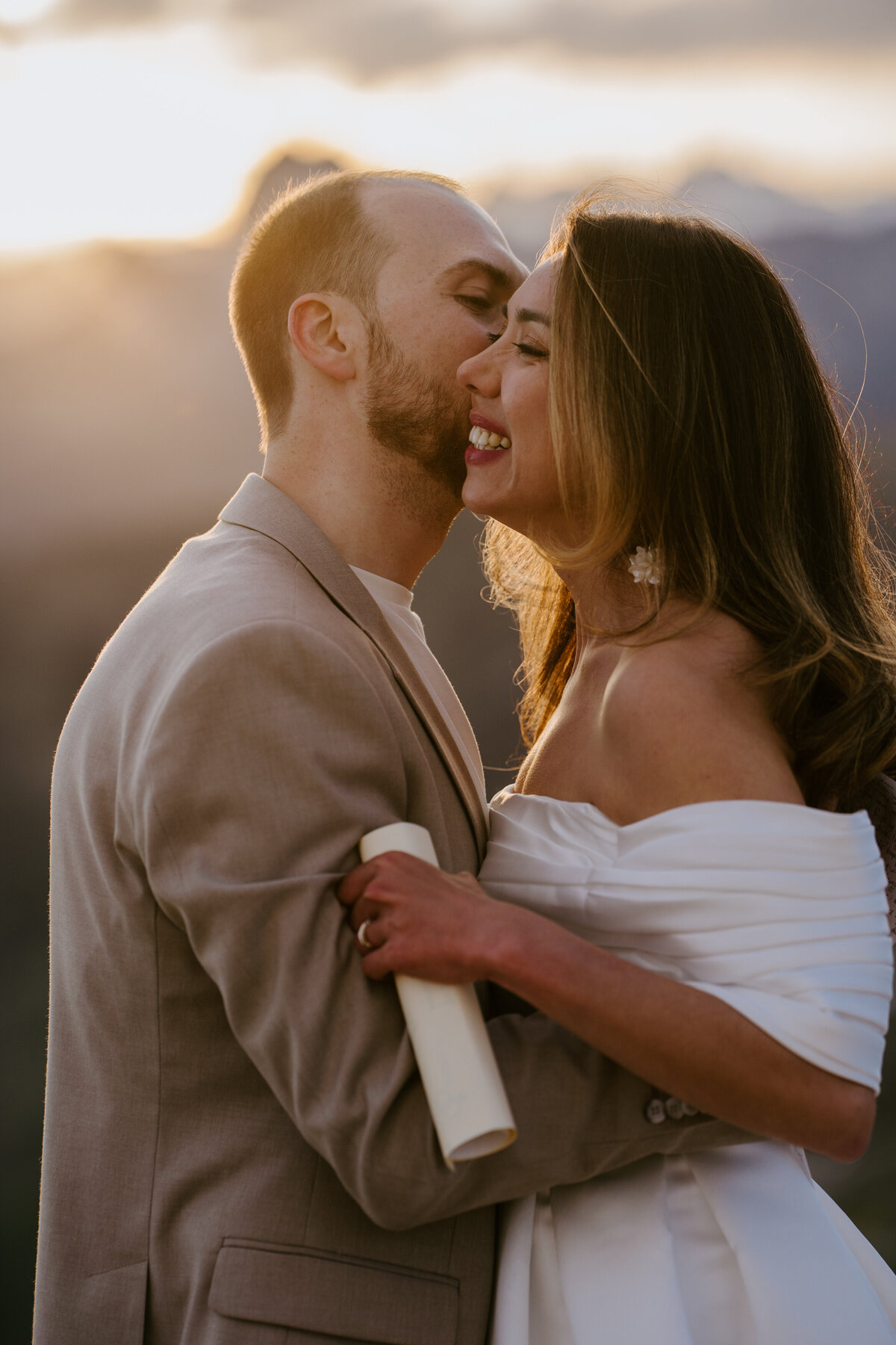 happy couple close up shot together in mountain elopement in Dolomites