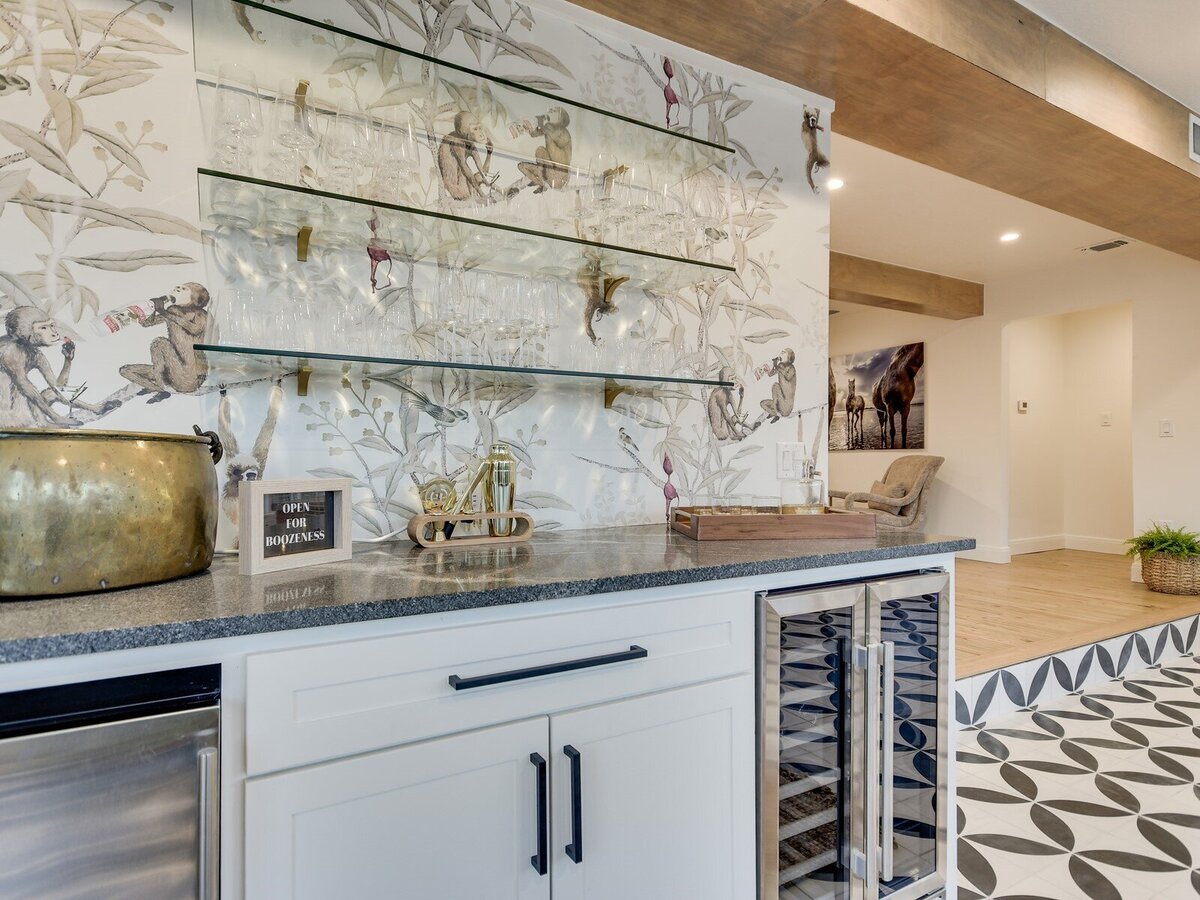 Sunroom bar with decorative wall paper and tile