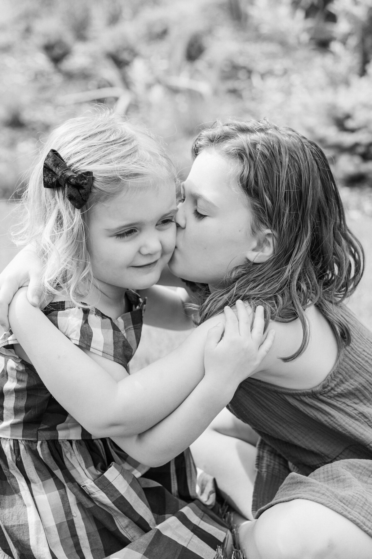 Siblings embrace