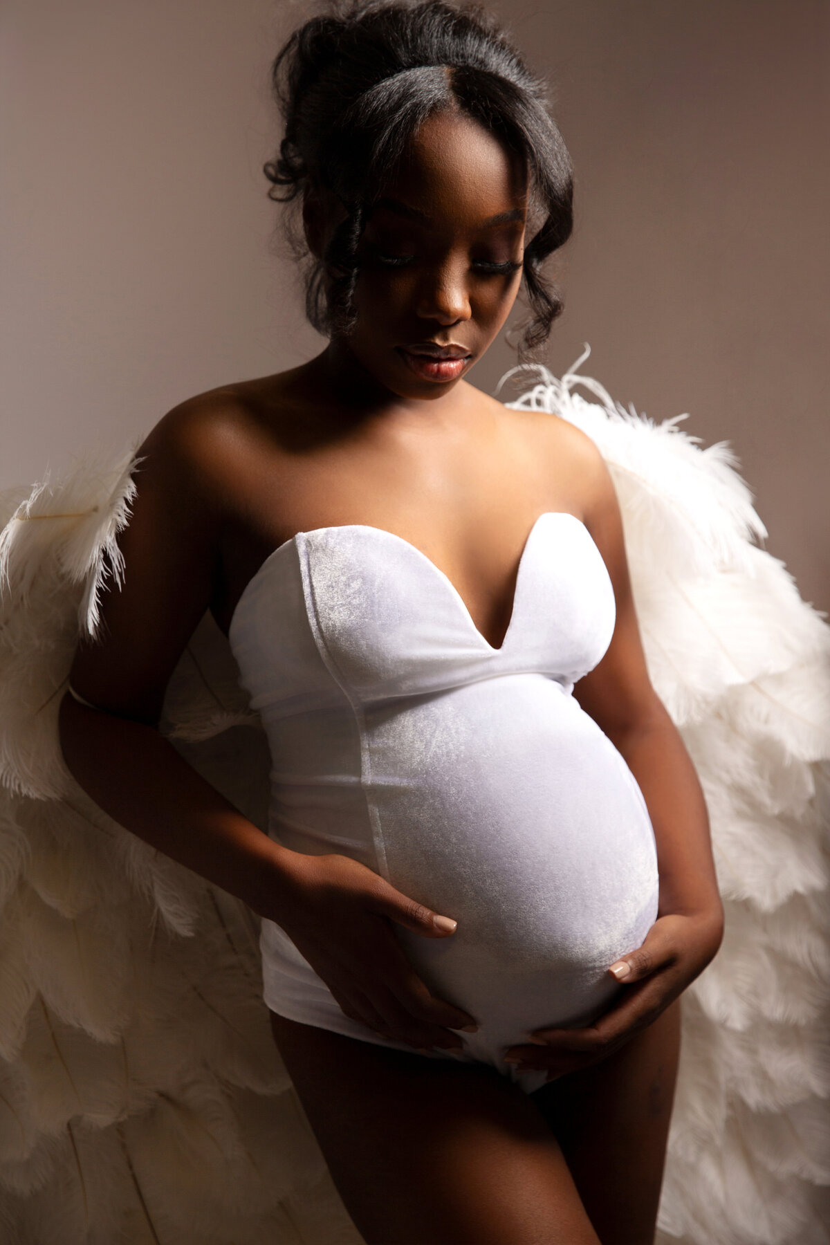 Angel wing maternity portrait with mom.