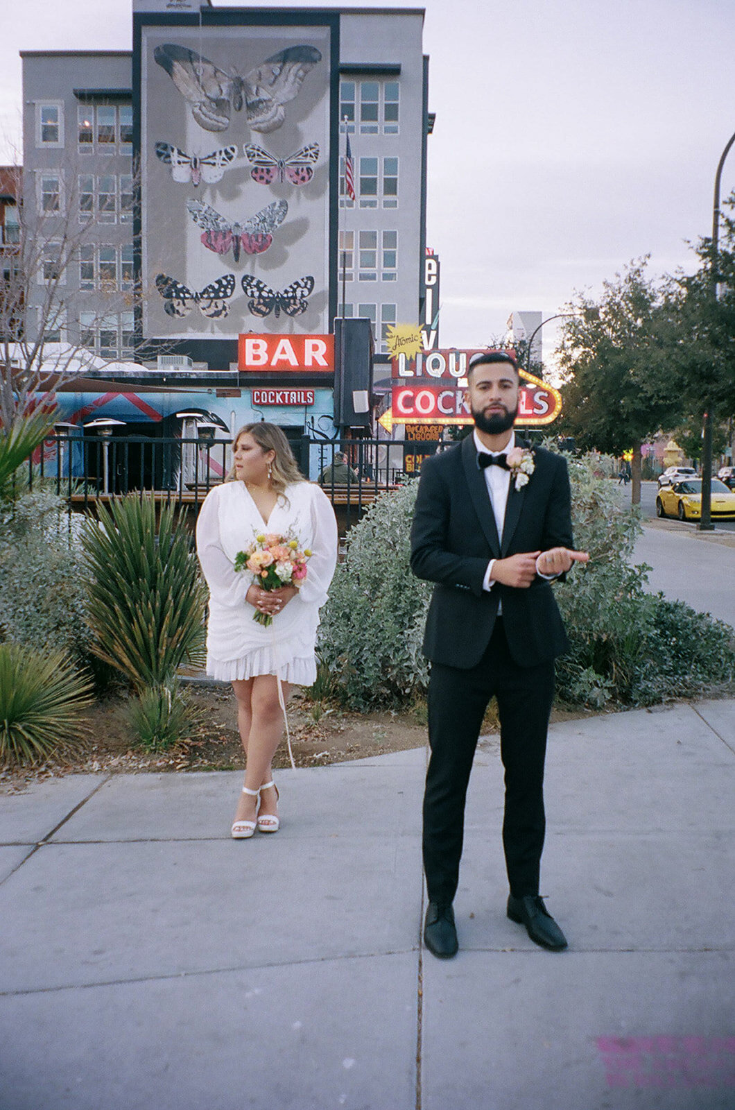 Bride and Groom outside of Atomic Liquors in Las Vegas