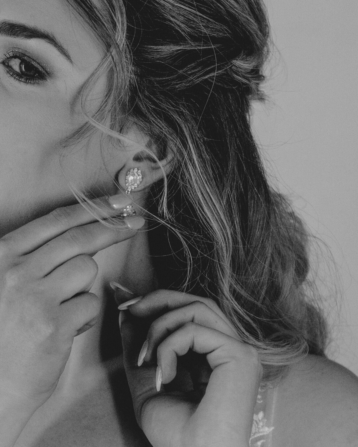 denver colorado wedding photographer - bride putting earrings on