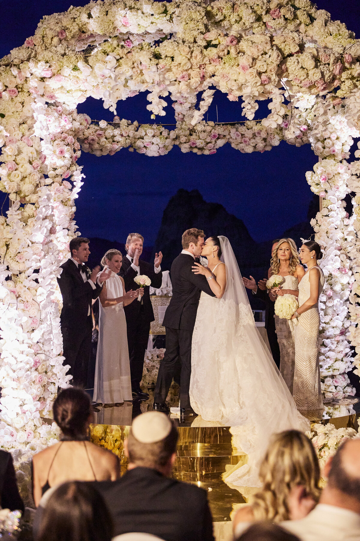 Ceremony at dusk under chuppah at Amangiri Utah