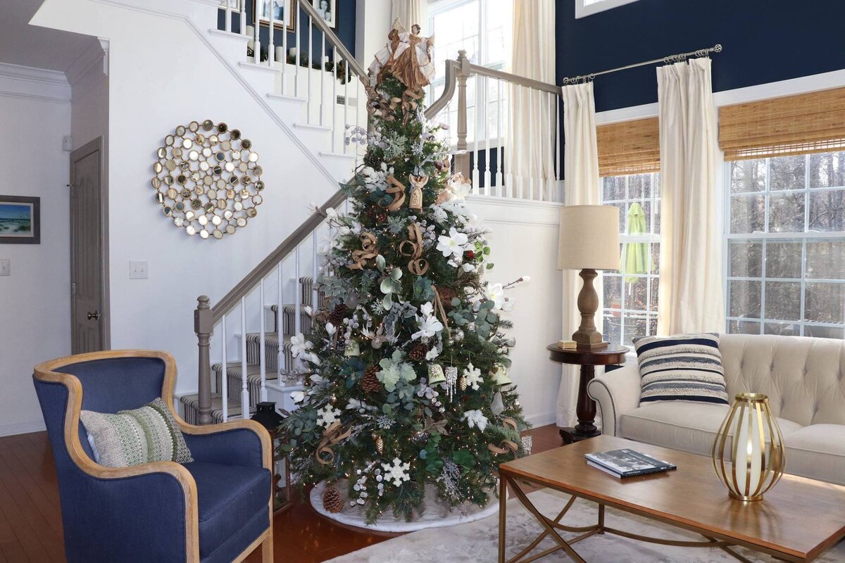 christmas tree with navy blue living room