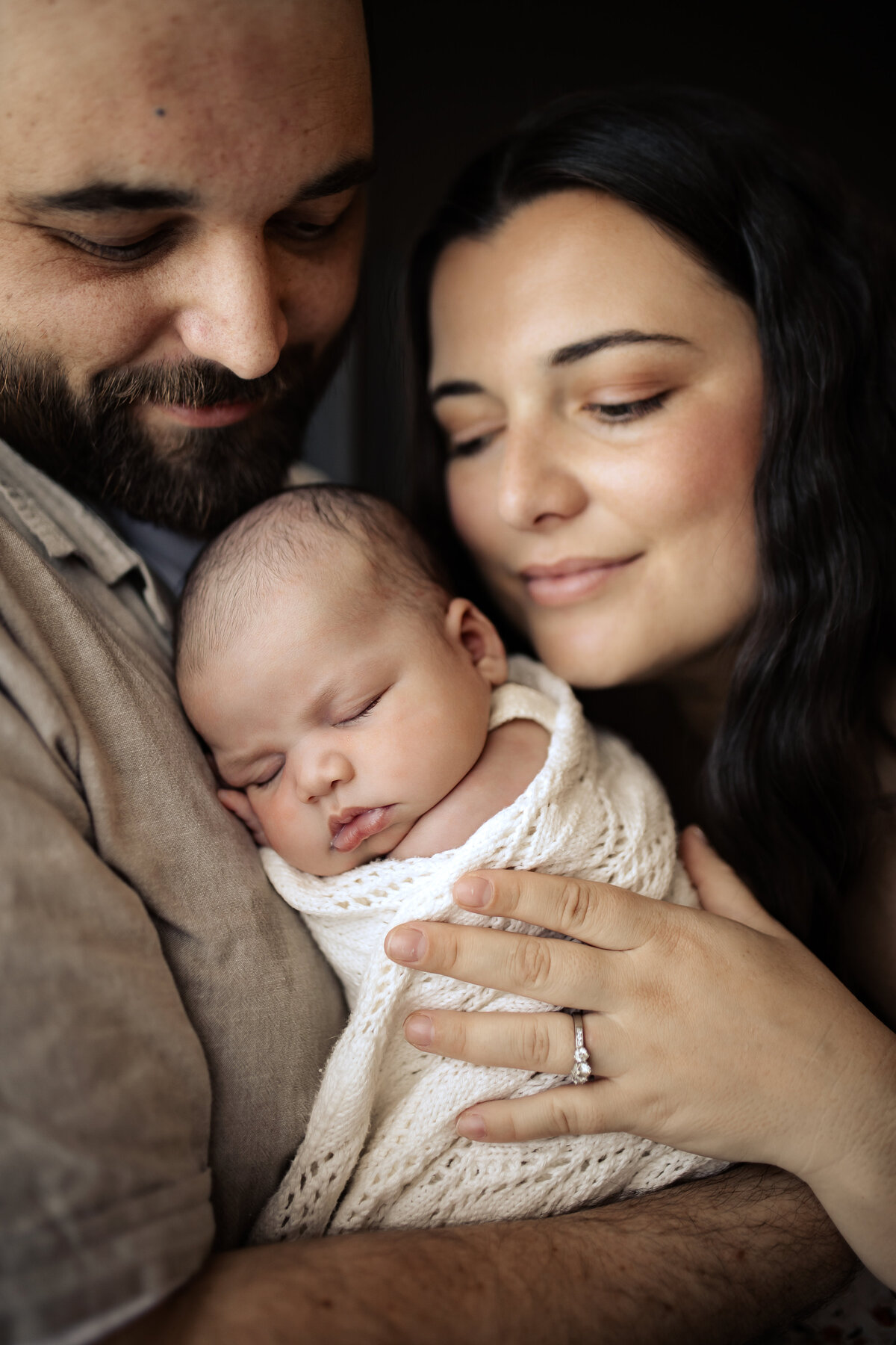 Newborn baby yawning peacefully in a cozy Hawke’s Bay home – heartwarming newborn photography by a local Hawke’s Bay photographer, capturing tender moments in Napier, Hastings, and Havelock North
