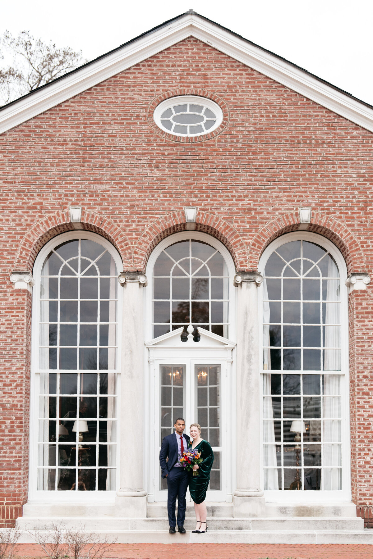 bride and groom pose together at Oxmoor Farm Estate Home