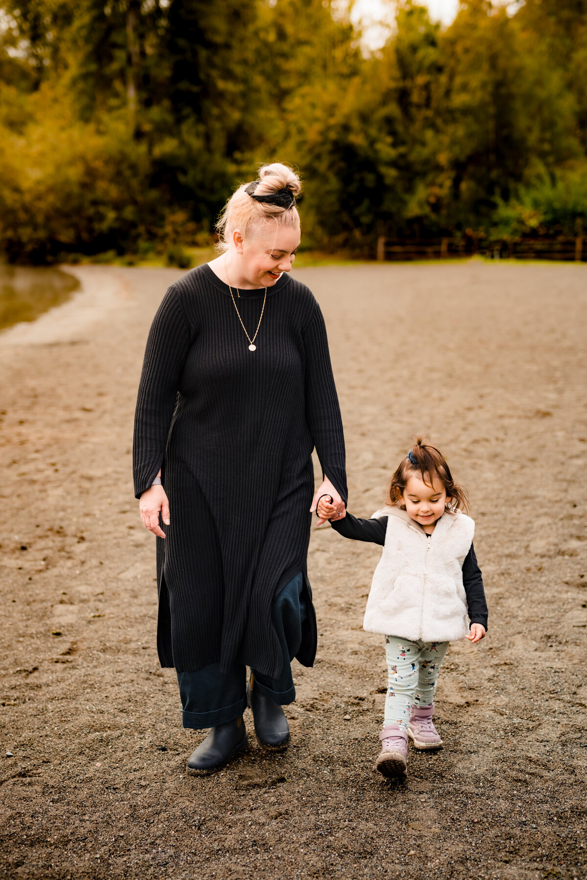 mother-daughter-walking-beachside-family-photoshoot