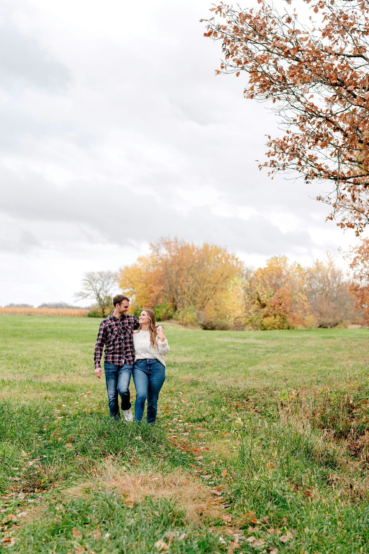 couple-walking-together-fall-session