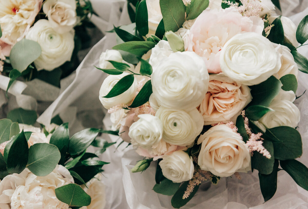 White and pink rose, and eucalyptus bouquets