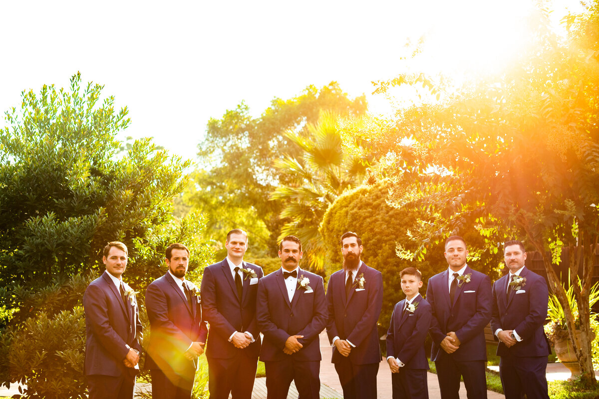 Bridal party portrait with bright yellow dresses and bold floral