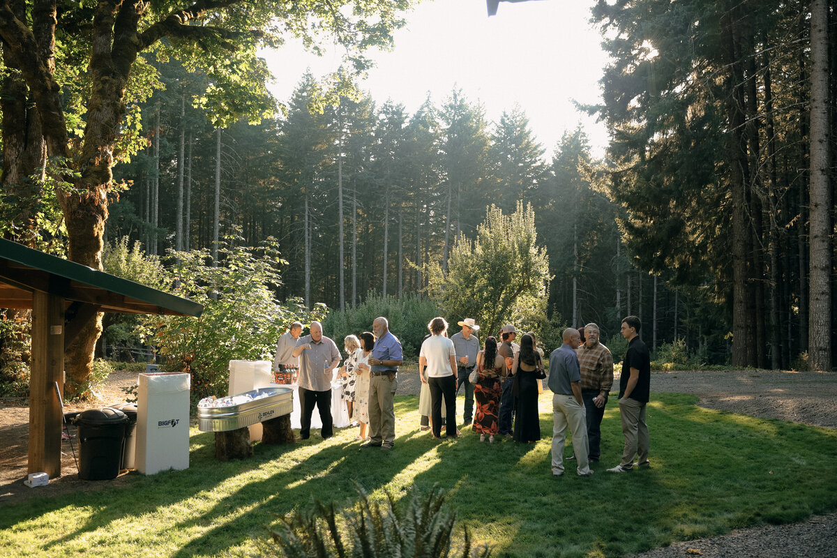 Guests Mingling During Golden Hour Reception | Documentary-Style Oregon Wedding Photography