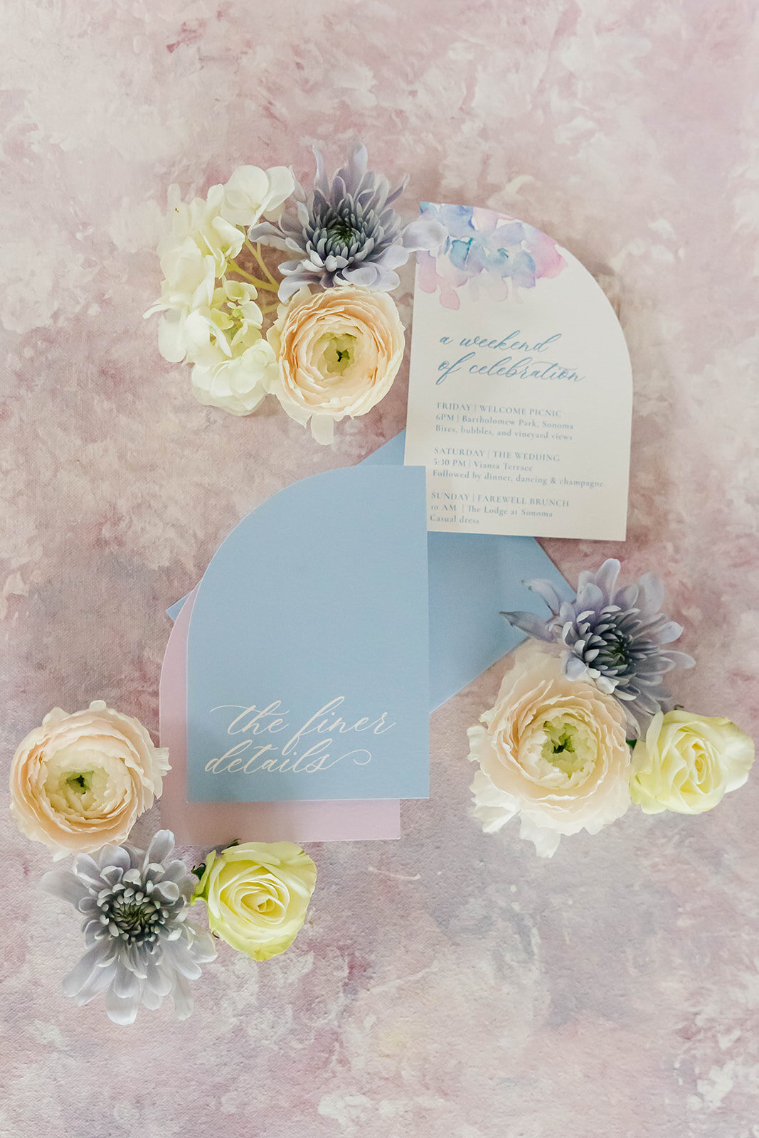 half-arch-blue-details-card-wedding-invite-flatlay