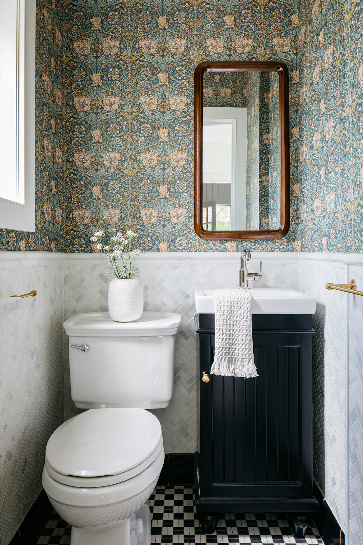 wallpapered half bath