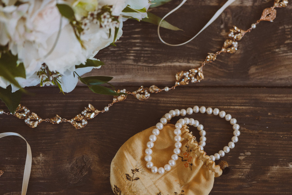 wedding details on a wooden table