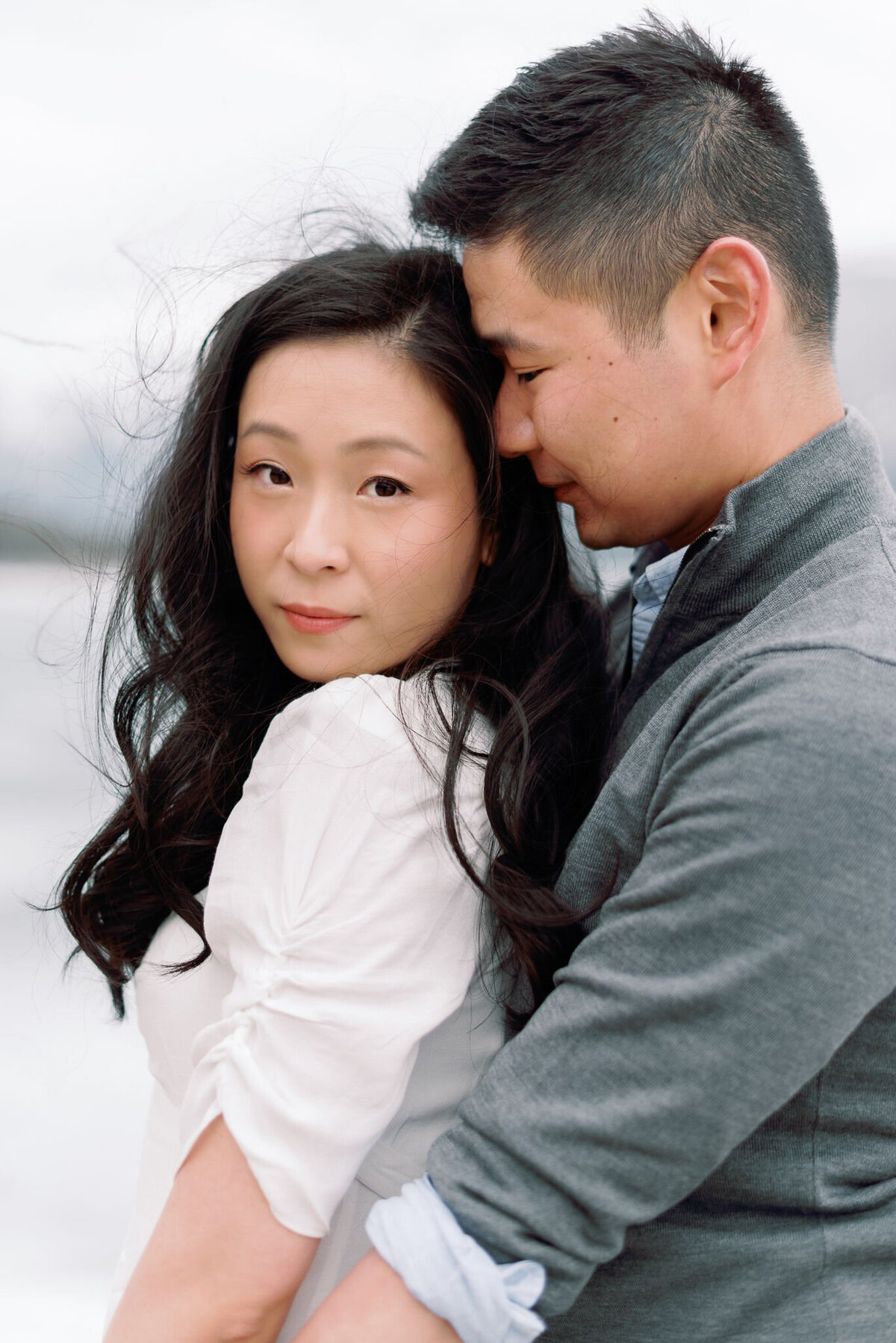 Engaged couple captured by Kaity Body Photography, elegant film inspired wedding photographer in Calgary, Alberta. Featured on the Bronte Bride Vendor Guide.