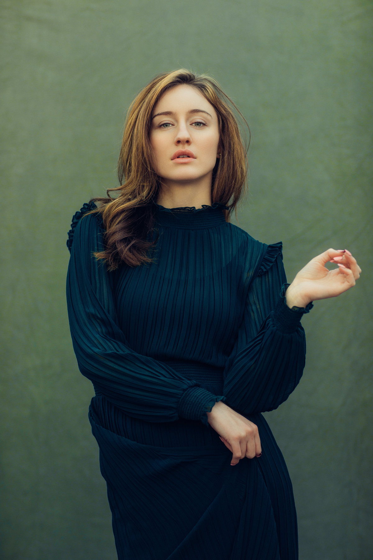 Portrait Photo Of Young Woman In Dress With Her Chin Up Los Angeles