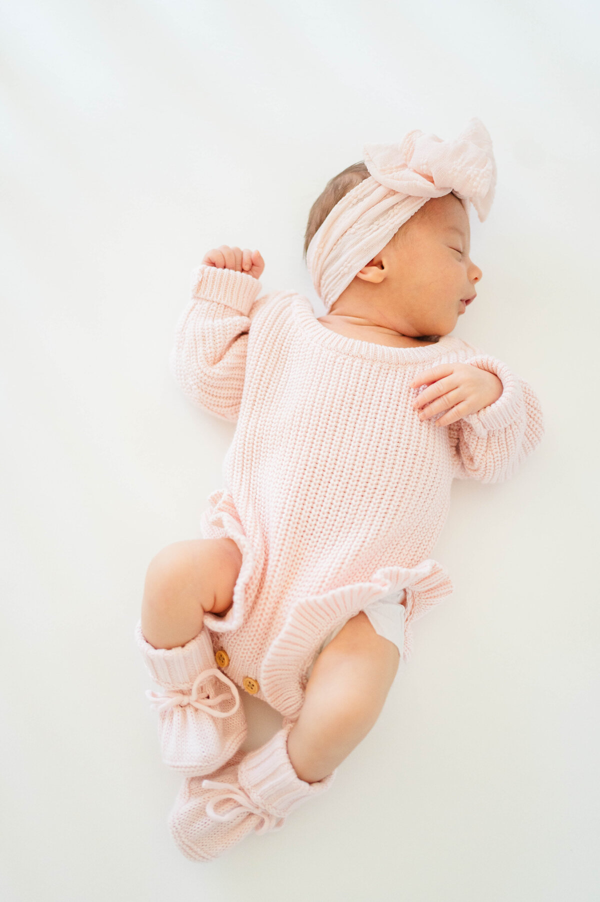 Newborn baby girl taken in Douglas, MA by the best newborn photographer in central Massachsuetts