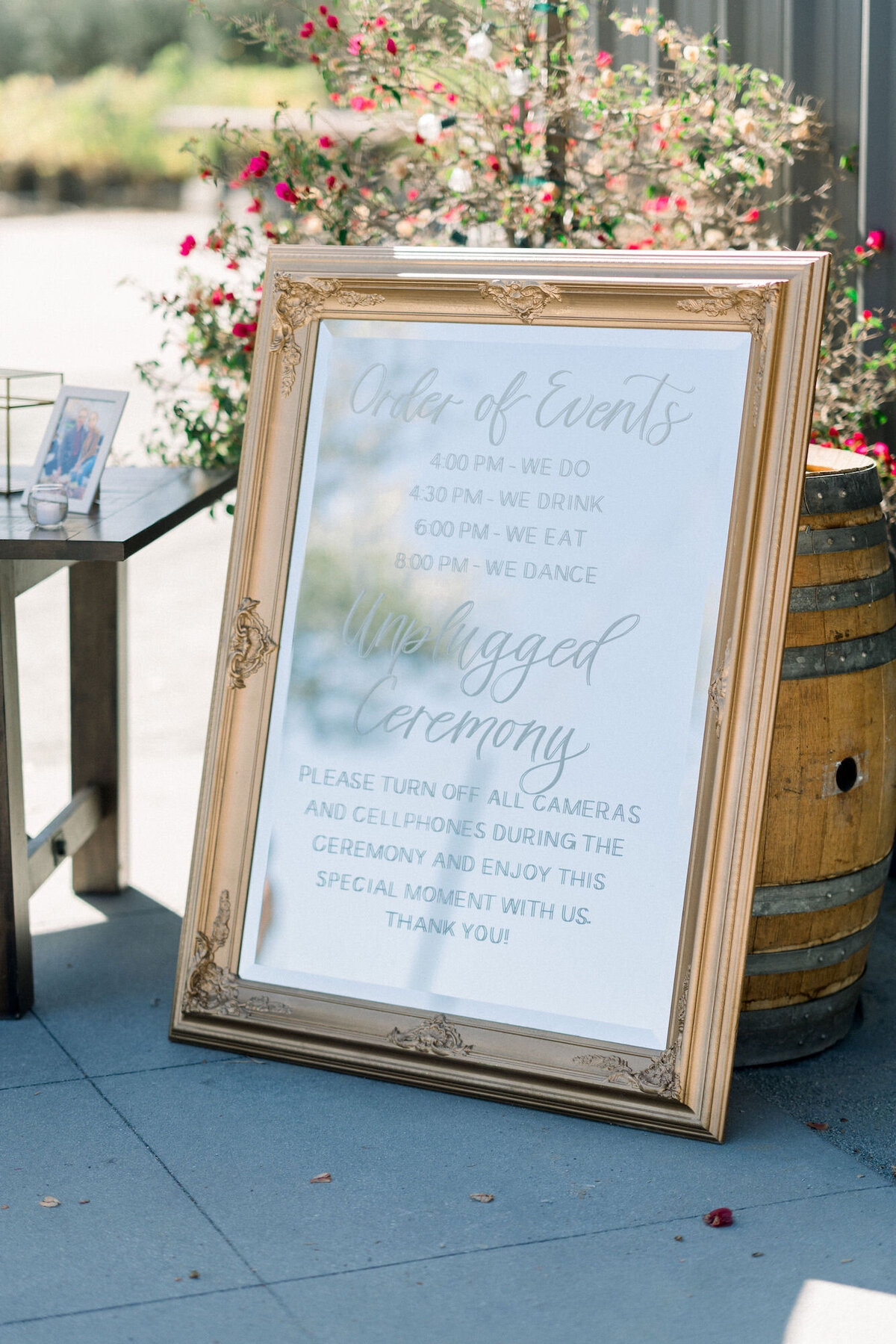 Unplugged sign in handwritten calligraphy on gold framed mirror