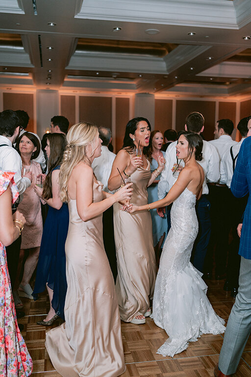 Wedding guests enjoying wedding reception at Hotel Crescent Court, Dallas