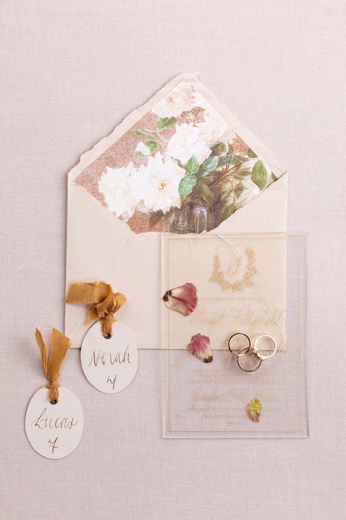 Acrylic-wedding-invitation-with-name-cards-and-wedding-bands