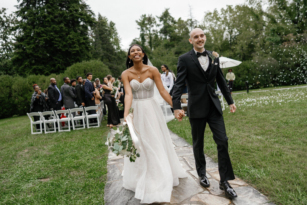 Ceremony recessional photographed by a DC wedding photographer.