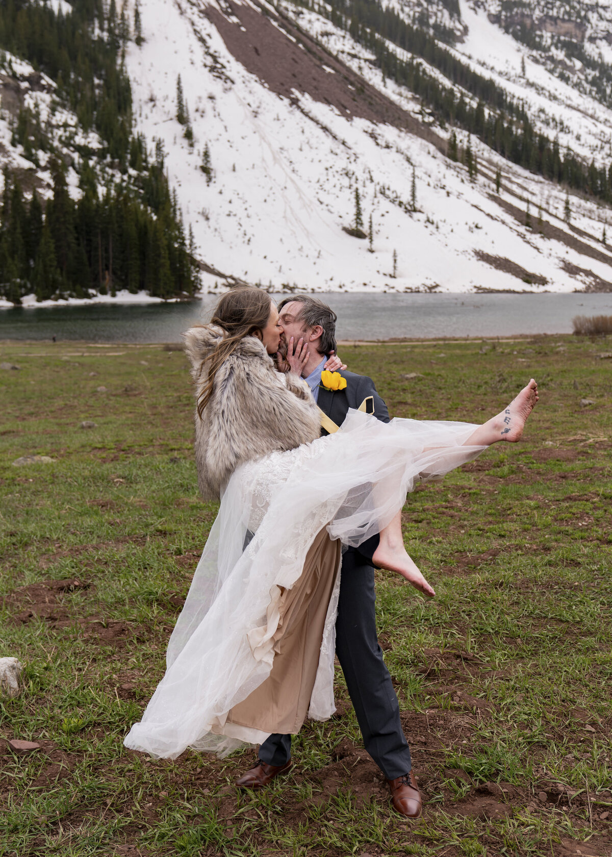 bride and groom kissing