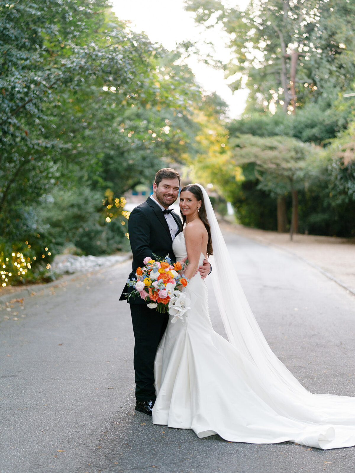bride and groom hugging
