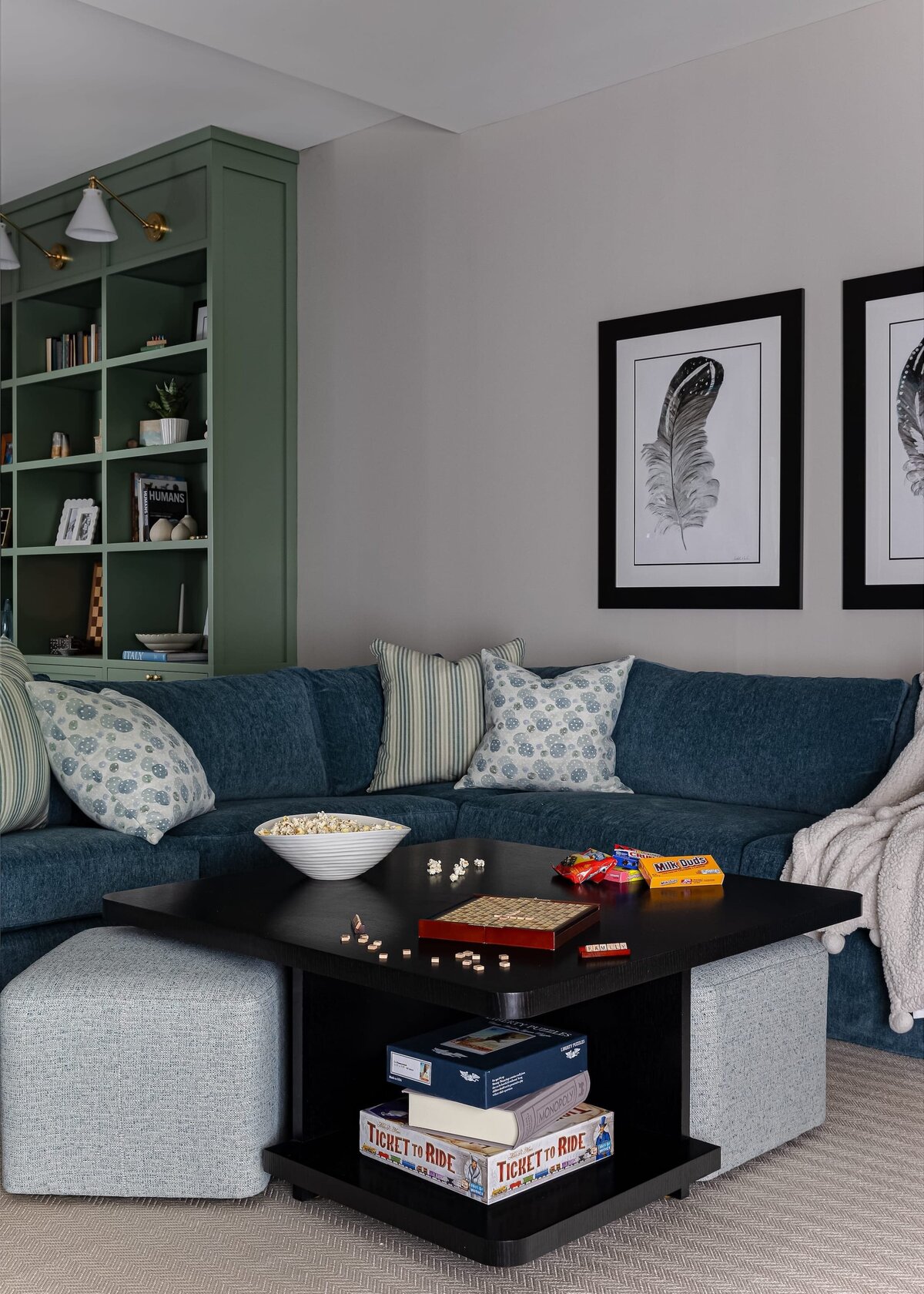 melinda chesson interiors meadowood place living room with blue sofa and popcorn on coffee table
