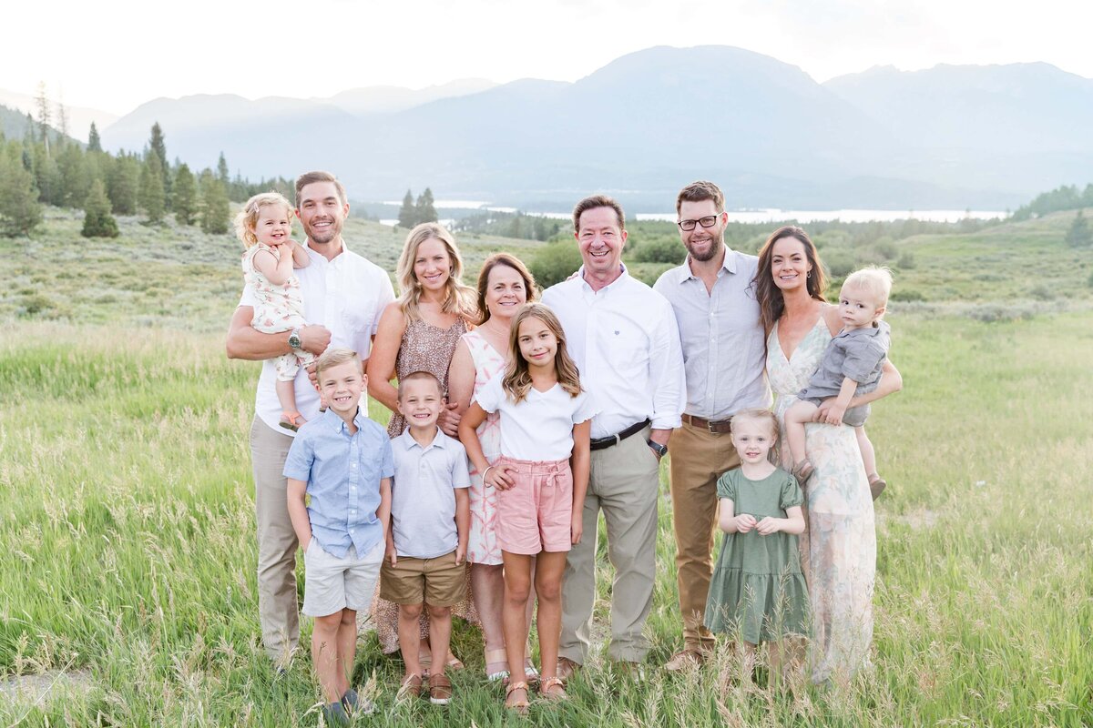 Extended Family looking at camera, colorado mountains