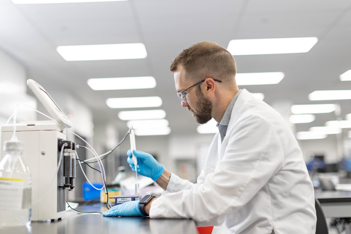 Man at a lab instrument