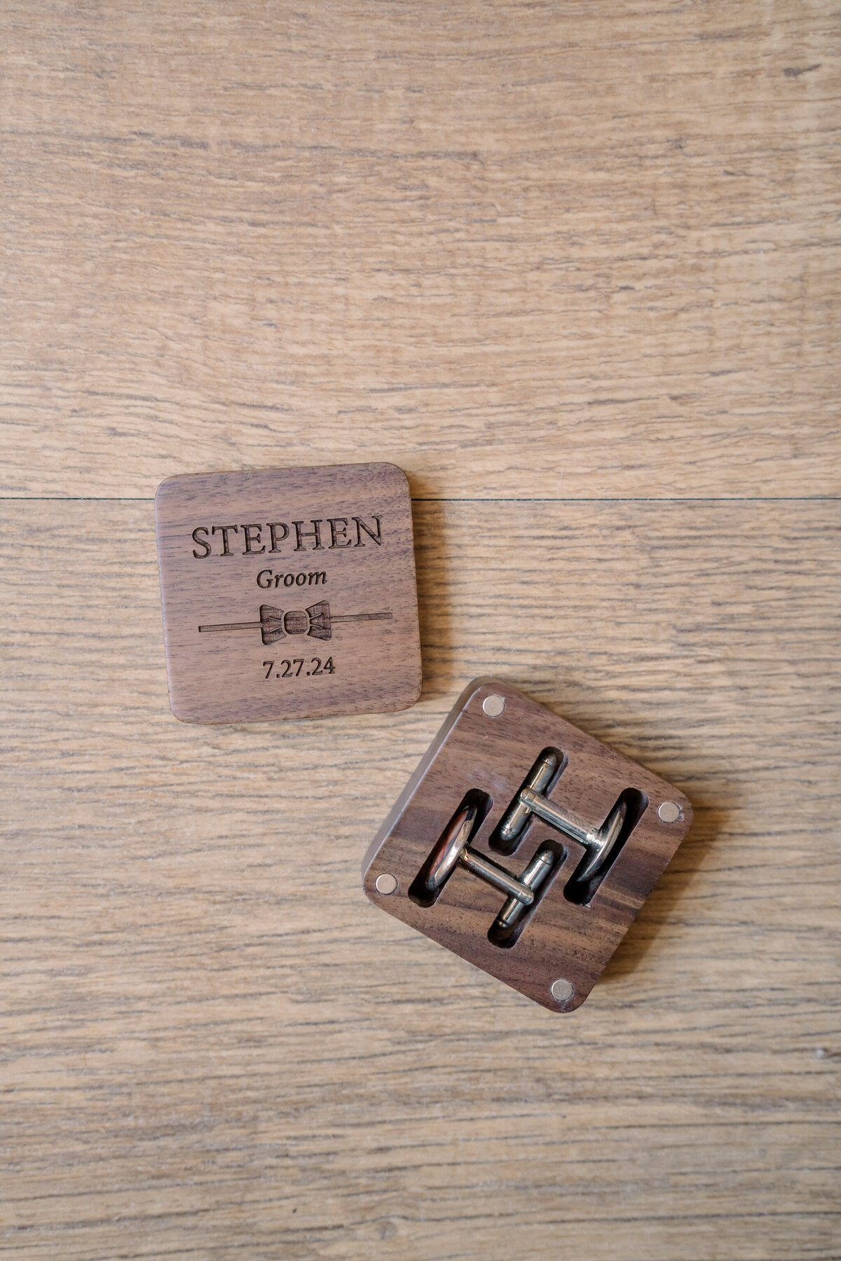 Weddings in Spain | A personalized wooden cufflink case sits on a hardwood floor in a Spanish home.