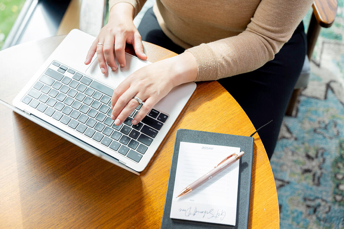 up close shot of a social media marketer working on a computer