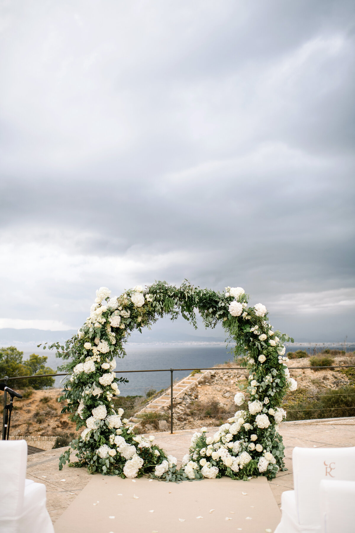 wedding ceremony flower arch at cap rocat mallorca