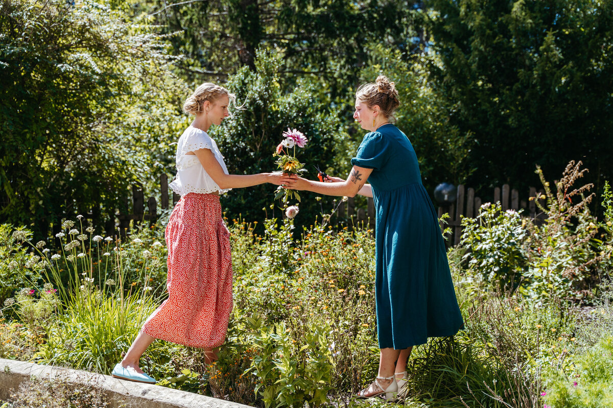 picking flowers together in sustainable hotel garden