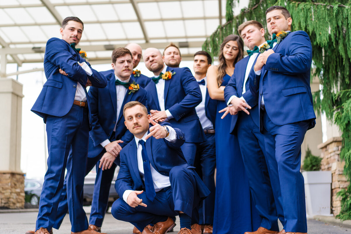 Groom with his squad posed like a band poster at the Hampton Inn Hotel in Youngstown, Ohio.