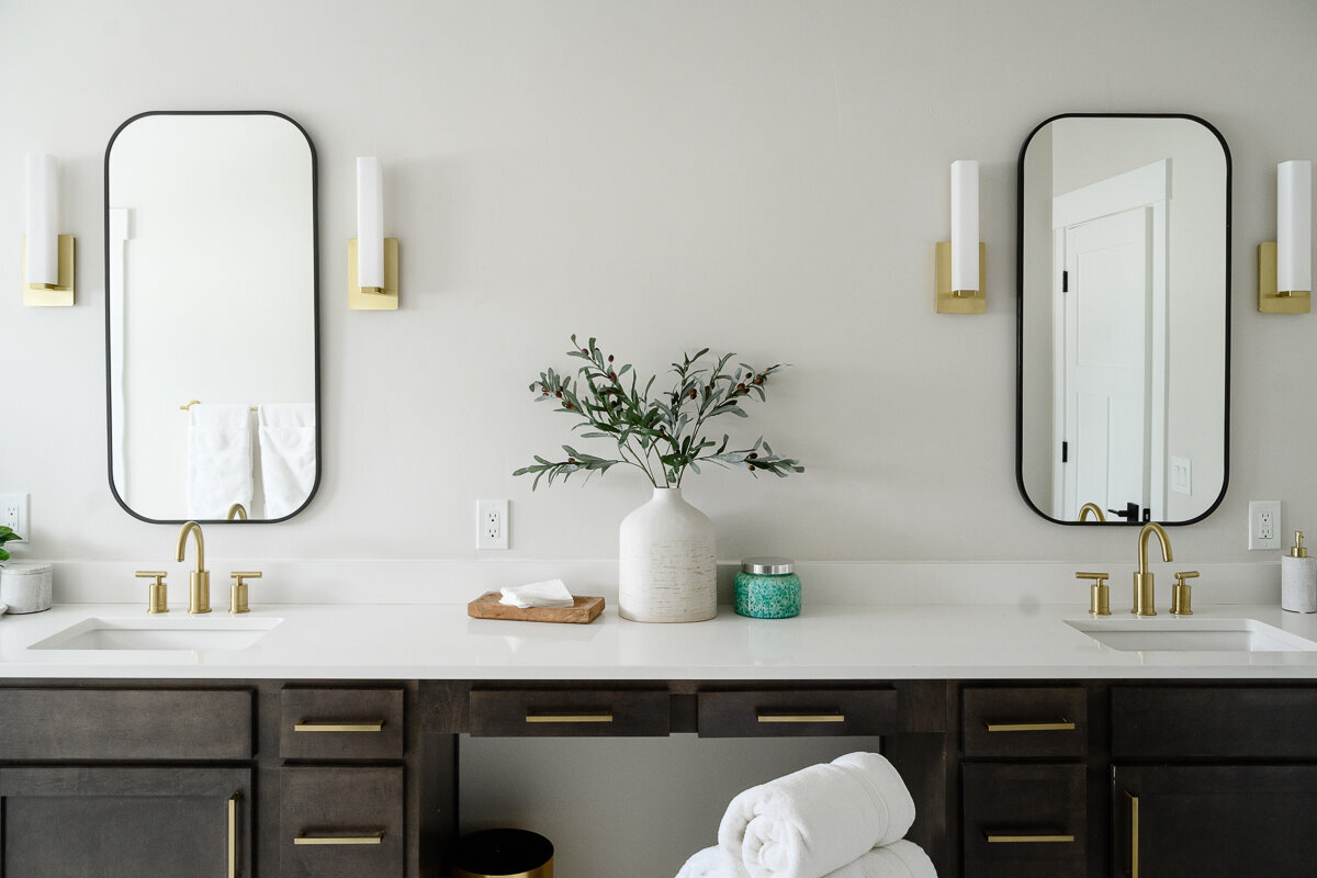 A product and interior photographer in Denver takes a picture of a beautiful bathroom with two sinks for a Denver commercial photography session and commercial photos for a branding pictures.