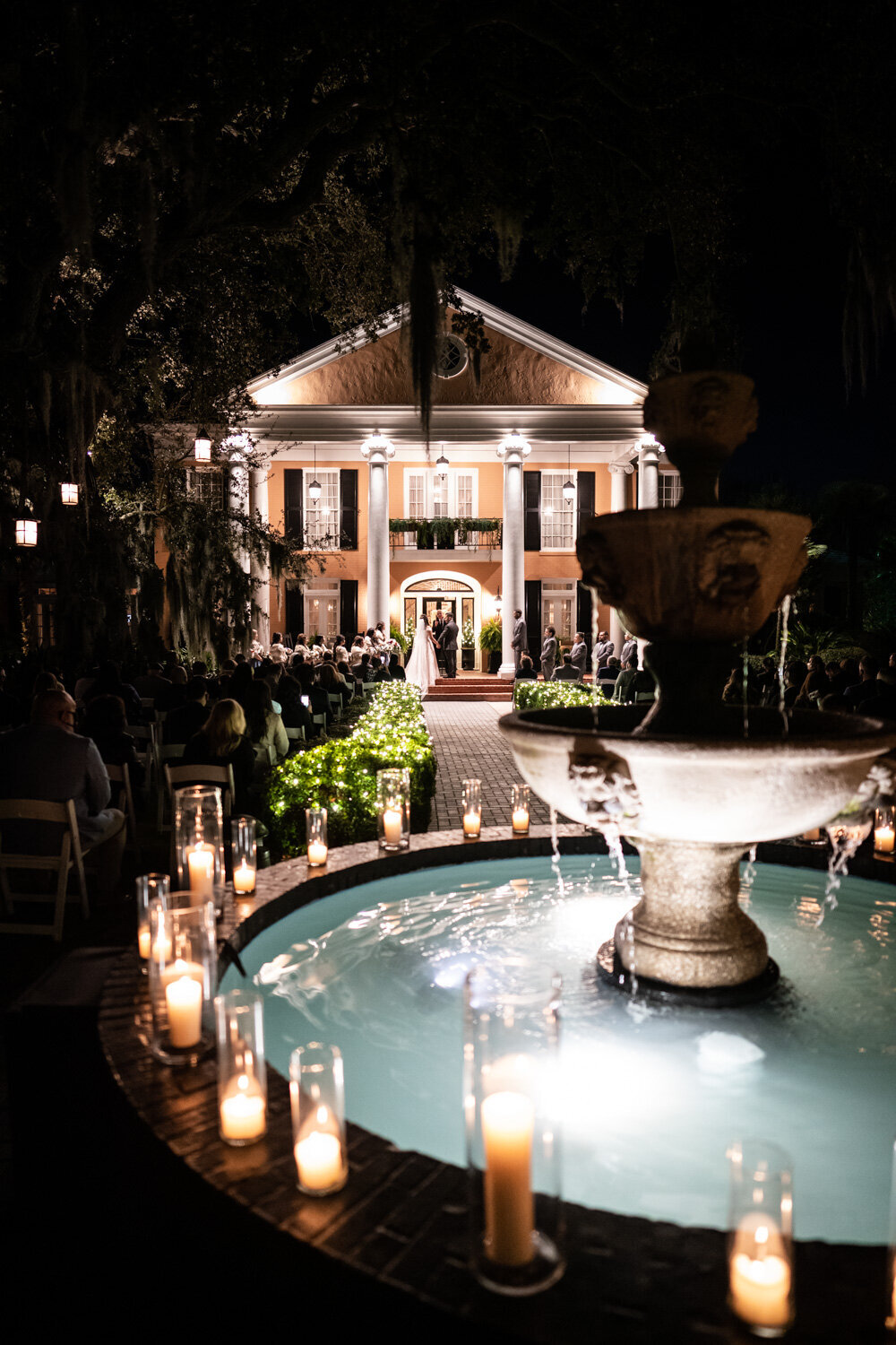 Wedding ceremony at Southern Oaks with fountain in the foreground