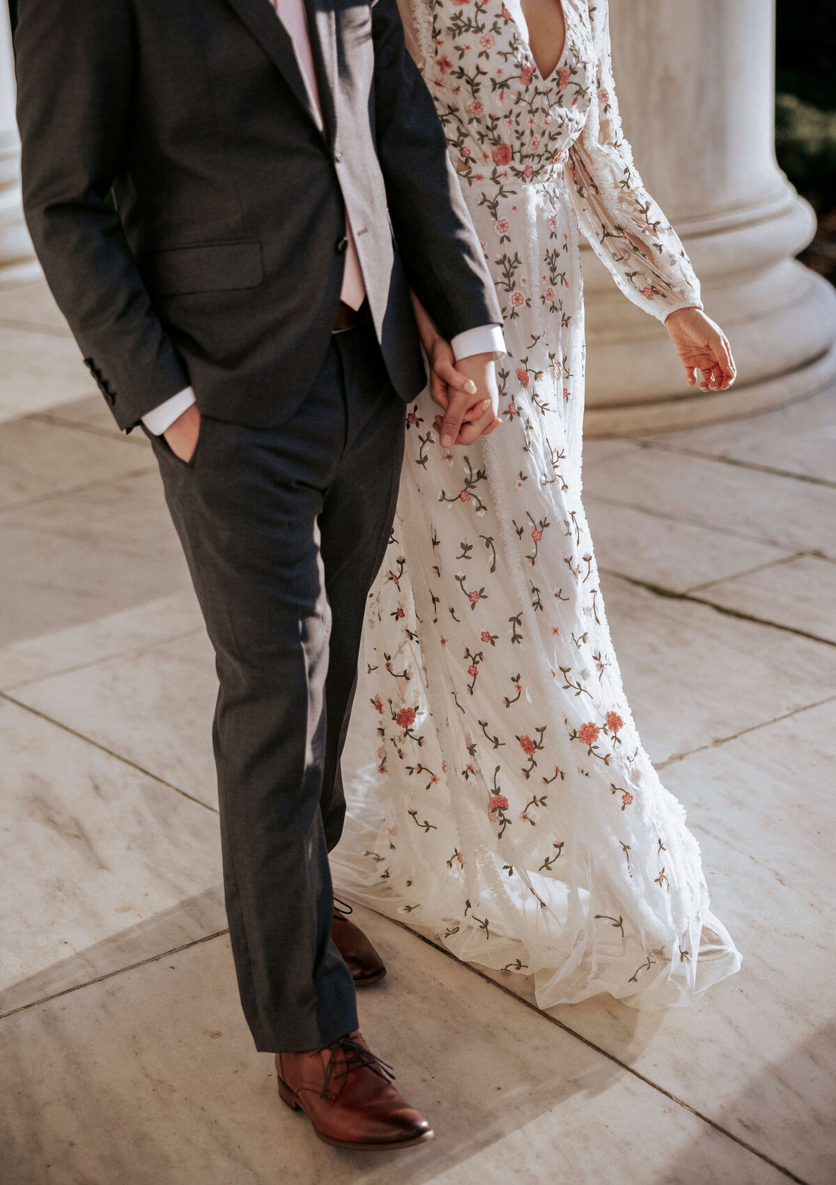 sophisticated-couple-walking-hand-in-hand