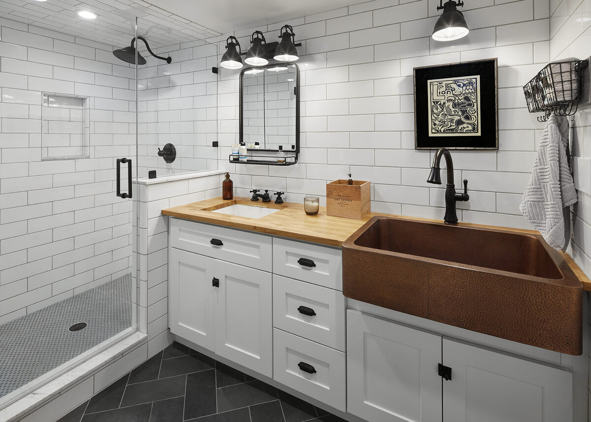 White bathroom design with brown farm sink