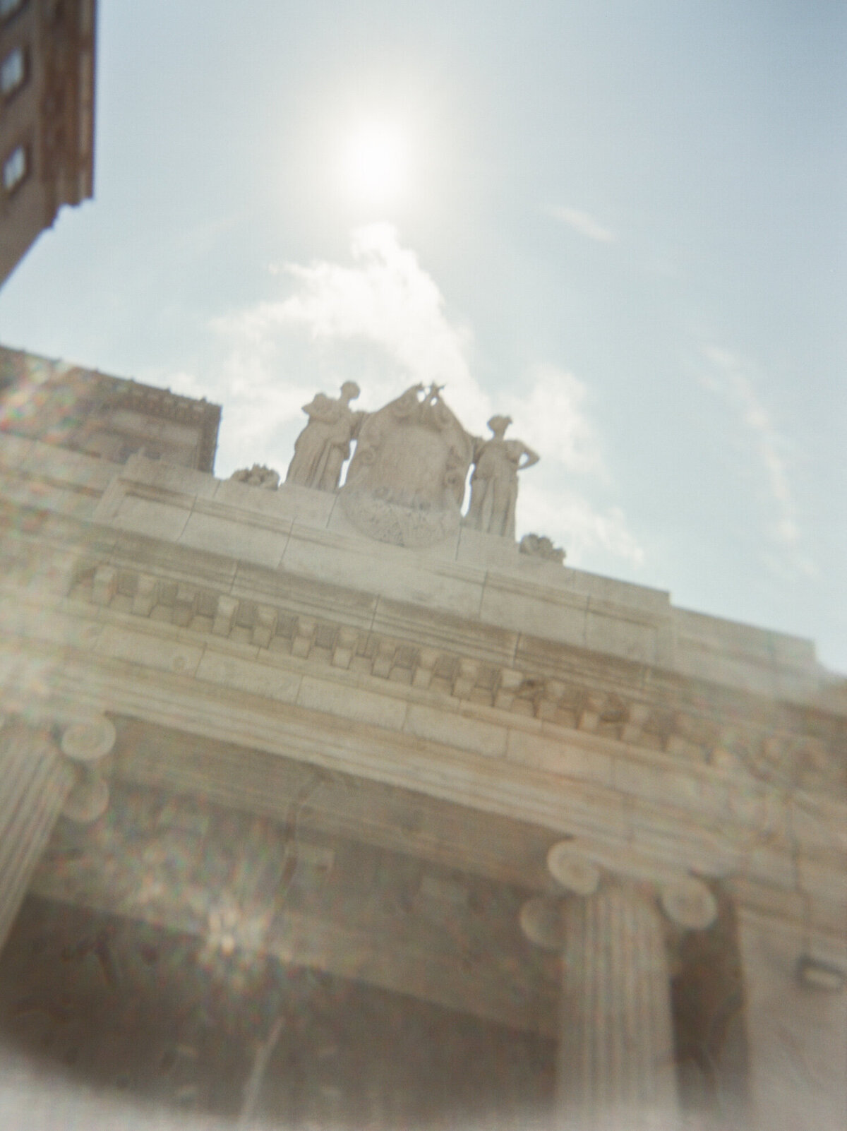 soft abstract film photography shows architectural detail of State Savings Bank in Detroit