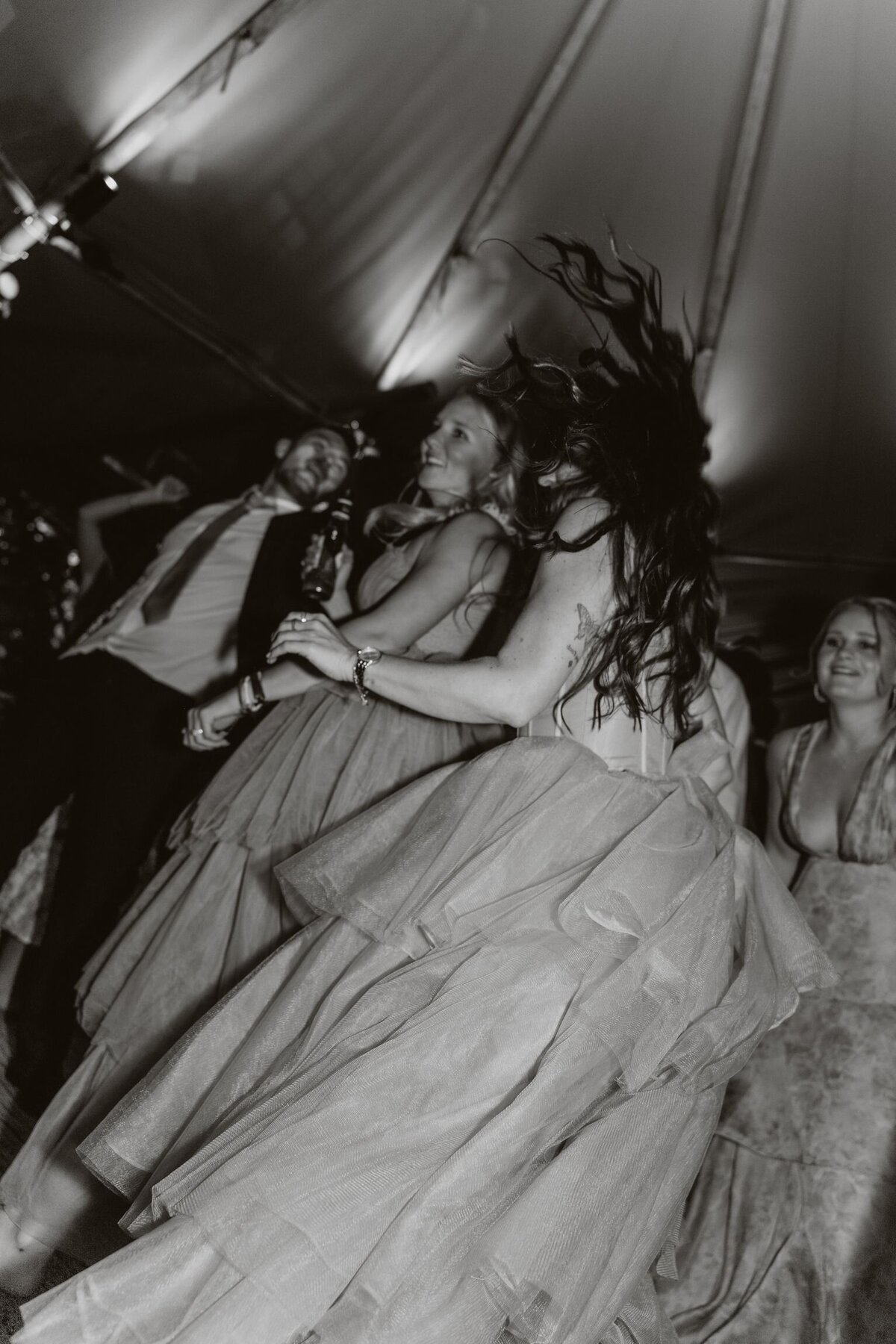 Nightime fun on the dancefloor of a manorbier castle wedding