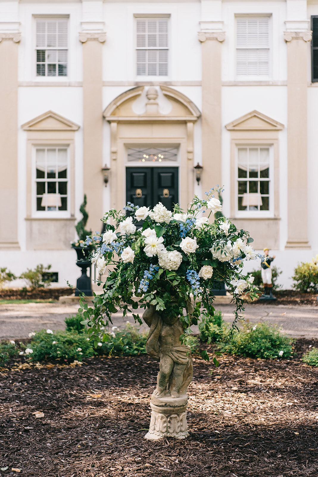 White and blue reception florals designed by Abby Grace Florals at Greenville SC wedding