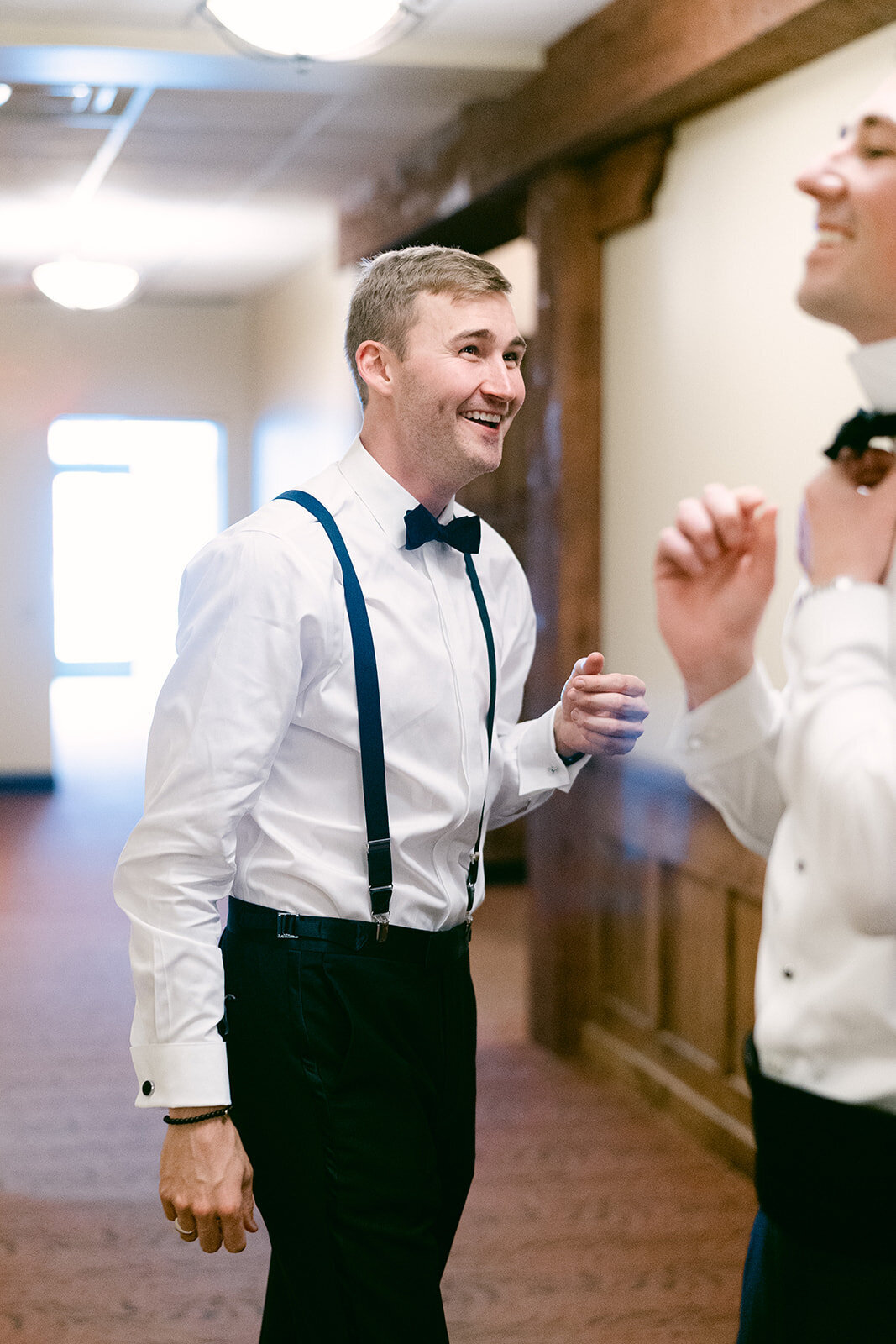 groomsmen laughing shot by Philadelphia wedding photographer.